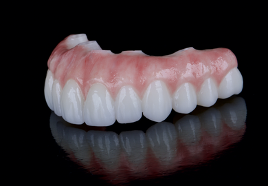 Dental prosthesis on a black background